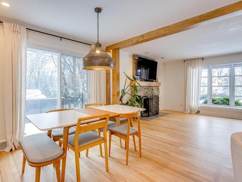 Dining room - 142 Rue Crestwood, Rosemère, QC - Indoor Photo Showing Dining Room With Fireplace