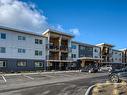 204-4810 Cedar Ridge Pl, Nanaimo, BC  - Outdoor With Balcony With Facade 