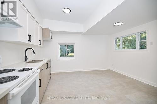 1 - 245 Stanton Street, Fort Erie (332 - Central), ON - Indoor Photo Showing Kitchen With Double Sink