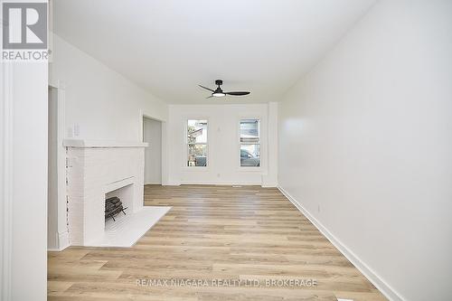 1 - 245 Stanton Street, Fort Erie (332 - Central), ON - Indoor Photo Showing Other Room With Fireplace