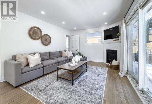 1023 Centre Street N, Whitby, ON - Indoor Photo Showing Living Room With Fireplace