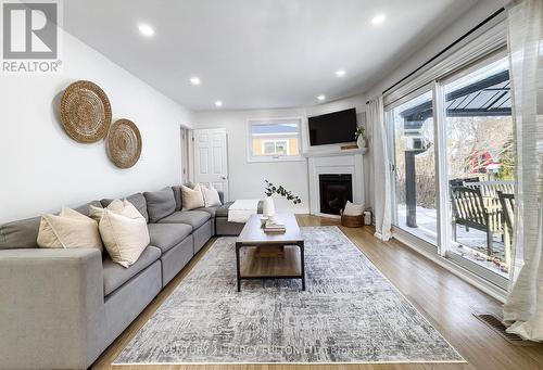 1023 Centre Street N, Whitby, ON - Indoor Photo Showing Living Room With Fireplace