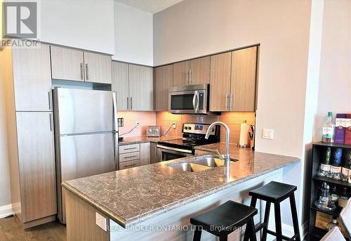 Ph04 - 65 Speers Road, Oakville, ON - Indoor Photo Showing Kitchen With Stainless Steel Kitchen With Double Sink