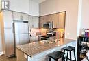 Ph04 - 65 Speers Road, Oakville, ON  - Indoor Photo Showing Kitchen With Stainless Steel Kitchen With Double Sink 