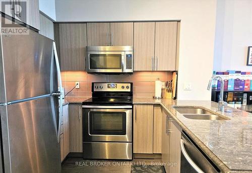 Ph04 - 65 Speers Road, Oakville, ON - Indoor Photo Showing Kitchen With Stainless Steel Kitchen With Double Sink With Upgraded Kitchen