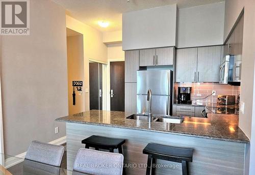 Ph04 - 65 Speers Road, Oakville, ON - Indoor Photo Showing Kitchen With Double Sink