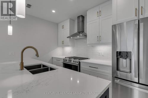 607 - 129 South Street N, Gananoque, ON - Indoor Photo Showing Kitchen With Double Sink With Upgraded Kitchen