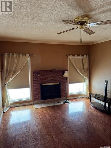 1072 111Th Street, North Battleford, SK - Indoor Photo Showing Living Room With Fireplace