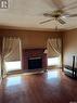 1072 111Th Street, North Battleford, SK  - Indoor Photo Showing Living Room With Fireplace 