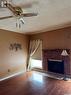 1072 111Th Street, North Battleford, SK  - Indoor With Fireplace 