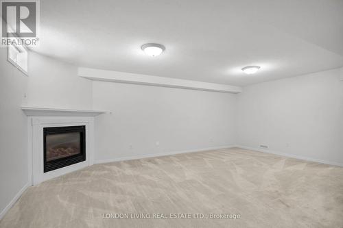 67 Daybreak Court, London, ON - Indoor With Fireplace