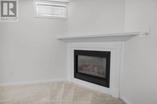 67 Daybreak Court, London, ON - Indoor With Fireplace