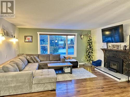 333 Vanderview Drive, Vanderhoof, BC - Indoor Photo Showing Living Room With Fireplace