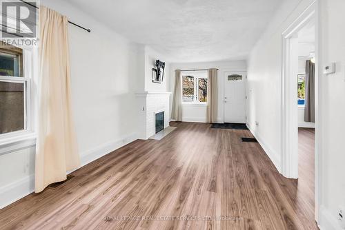 43 Montgomery Avenue, Toronto, ON - Indoor Photo Showing Other Room With Fireplace