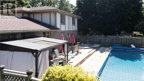 18 Conway Court, Zorra (Thamesford), ON - Outdoor With In Ground Pool With Deck Patio Veranda