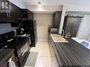 1107 5500 Mitchinson Way, Regina, SK  - Indoor Photo Showing Kitchen With Double Sink 