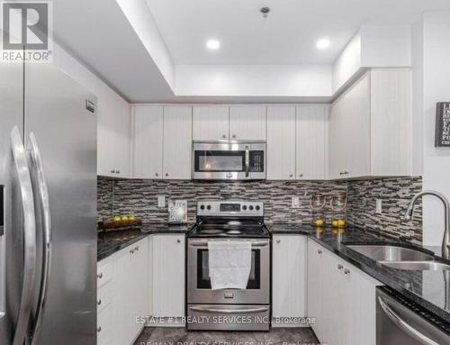 106 - 70 Baycliffe Crescent, Brampton, ON - Indoor Photo Showing Kitchen With Double Sink With Upgraded Kitchen