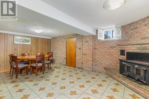 126 Giltspur Drive, Toronto, ON - Indoor Photo Showing Dining Room With Fireplace