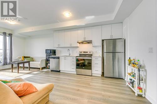 906 - 3200 William Coltson Avenue, Oakville, ON - Indoor Photo Showing Kitchen With Stainless Steel Kitchen