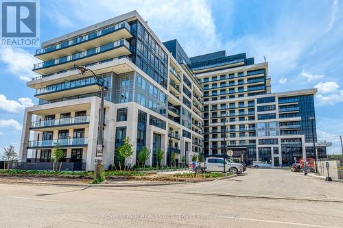 906 - 3200 William Coltson Avenue, Oakville, ON - Outdoor With Balcony With Facade