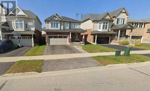 34 Andover Drive, Woolwich, ON - Outdoor With Deck Patio Veranda With Facade