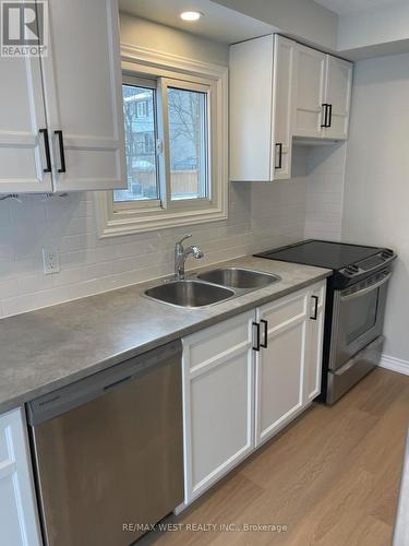 1 - 2322 Marine Drive, Oakville, ON - Indoor Photo Showing Kitchen With Double Sink