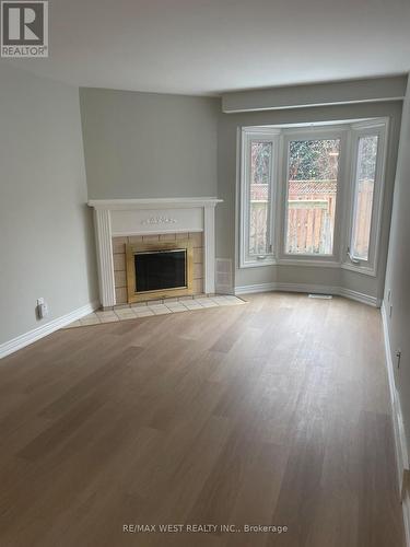 1 - 2322 Marine Drive, Oakville, ON - Indoor Photo Showing Living Room With Fireplace