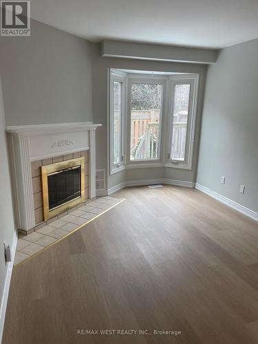 1 - 2322 Marine Drive, Oakville, ON - Indoor Photo Showing Living Room With Fireplace