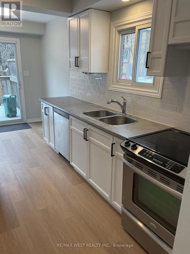 1 - 2322 Marine Drive, Oakville, ON - Indoor Photo Showing Kitchen With Double Sink