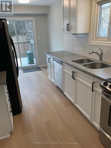 1 - 2322 Marine Drive, Oakville, ON - Indoor Photo Showing Kitchen With Double Sink