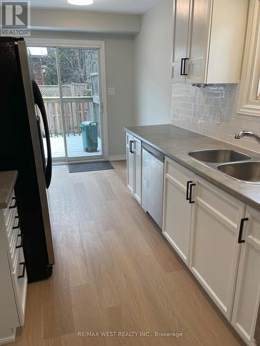 1 - 2322 Marine Drive, Oakville, ON - Indoor Photo Showing Kitchen With Double Sink