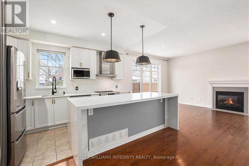 134 Abetti Ridge, Ottawa, ON - Indoor Photo Showing Kitchen With Fireplace With Upgraded Kitchen