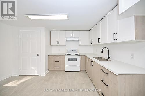 2 - 245 Stanton Street, Fort Erie (332 - Central), ON - Indoor Photo Showing Kitchen With Double Sink