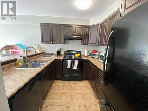 6 Devlin Crescent, Whitby (Blue Grass Meadows), ON - Indoor Photo Showing Kitchen With Double Sink