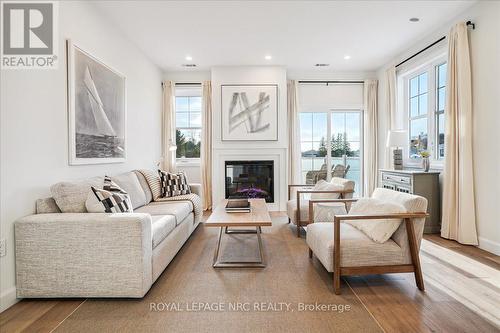 3 - 29 Cyclone Way, Fort Erie (337 - Crystal Beach), ON - Indoor Photo Showing Living Room With Fireplace