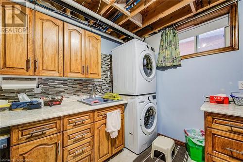 laundry area with walkup to garage - 48 Wayne Avenue, Cambridge, ON - Indoor Photo Showing Laundry Room