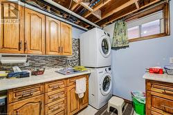 laundry area with walkup to garage - 