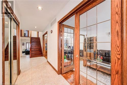 Entrance hallway, closet on the left side and living room and formal dining room on the right - 48 Wayne Avenue, Cambridge, ON - Indoor Photo Showing Other Room