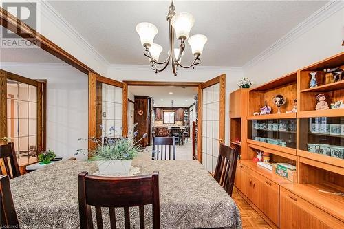 Formal dining room with double doors overlooking the kitchen - 48 Wayne Avenue, Cambridge, ON - Indoor