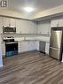 122 - 1593 Rose Way, Milton, ON  - Indoor Photo Showing Kitchen With Stainless Steel Kitchen 