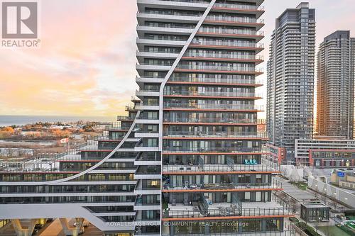 1202 - 33 Shore Breeze Drive, Toronto, ON - Outdoor With Balcony With Facade