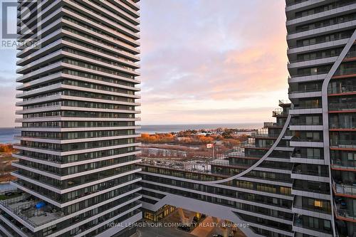 1202 - 33 Shore Breeze Drive, Toronto, ON - Outdoor With Balcony With Facade