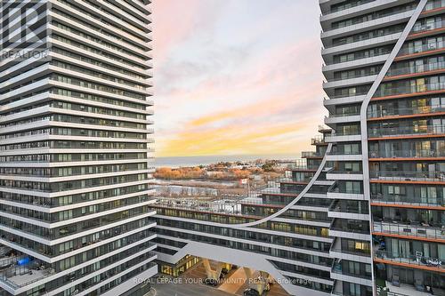 1202 - 33 Shore Breeze Drive, Toronto, ON - Outdoor With Balcony With Facade