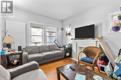 33 Cline Avenue N, Hamilton, ON - Indoor Photo Showing Living Room With Fireplace