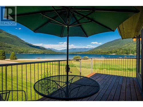 6459 Erindale Road, Nelson, BC - Outdoor With Body Of Water With Deck Patio Veranda With View With Exterior