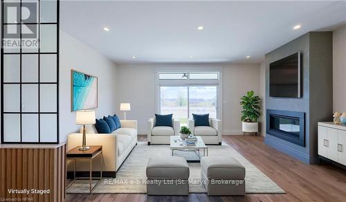 21 Orchard Drive, Stratford (Ellice), ON - Indoor Photo Showing Living Room With Fireplace