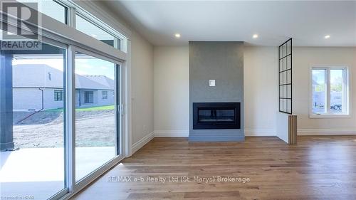 21 Orchard Drive, Stratford (Ellice), ON - Indoor With Fireplace