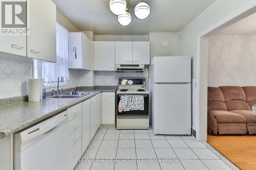 27 Dell Park Avenue, Toronto, ON - Indoor Photo Showing Kitchen With Double Sink