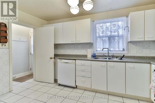 27 Dell Park Avenue, Toronto, ON - Indoor Photo Showing Kitchen With Double Sink