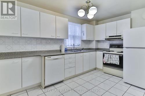 27 Dell Park Avenue, Toronto, ON - Indoor Photo Showing Kitchen With Double Sink